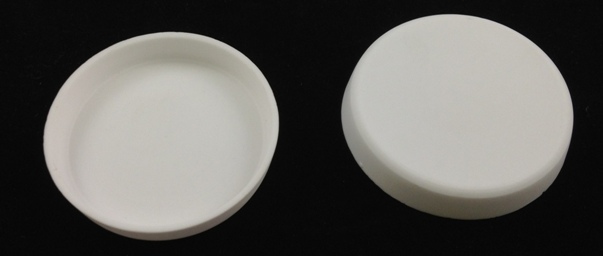 ar9048.jpg Alpha Resources Africa Product AR9048 in Ceramic Crucibles under Sample Containment.